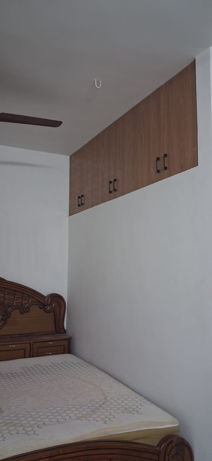 Loft Storage Bedroom by Anjaneya Interiors and Furniture, Coimbatore